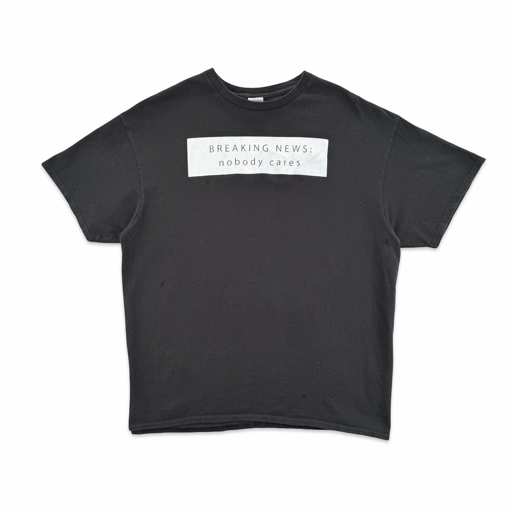 Breaking News: Nobody Cares Tee (XL)