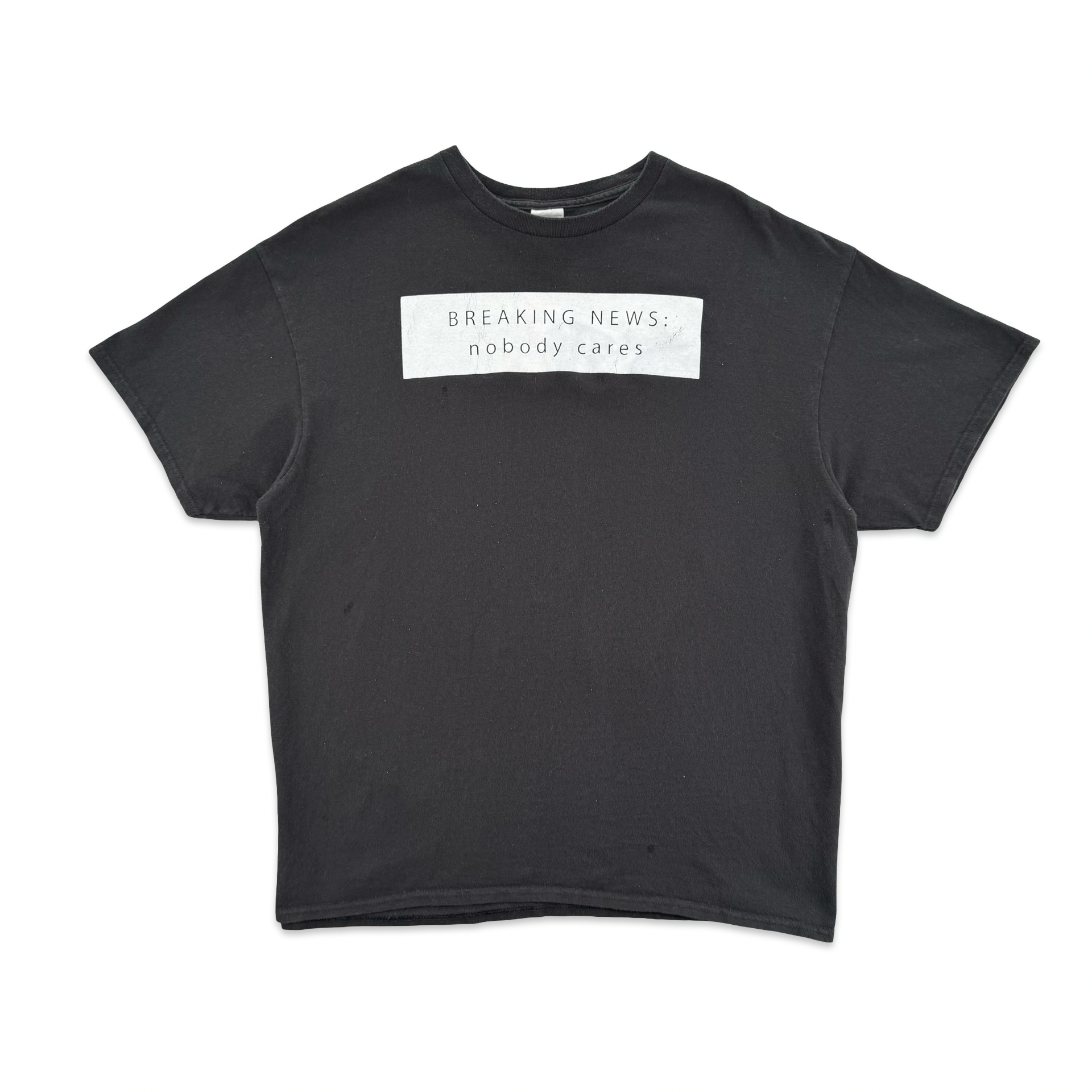 Breaking News: Nobody Cares Tee (XL)